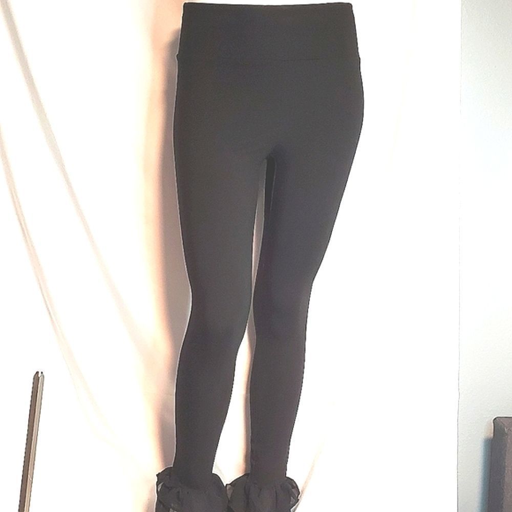 Bebe black leggings with ruffled cuff